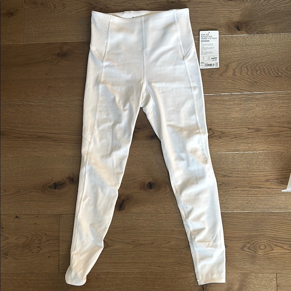 Athleta Stay Fly Reflective snake 7/8 tight. White  Leggings High-Waisted